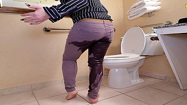 Whitney locked belt peeing her pants by toilet