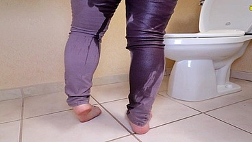 Whitney locked belt peeing her pants by toilet