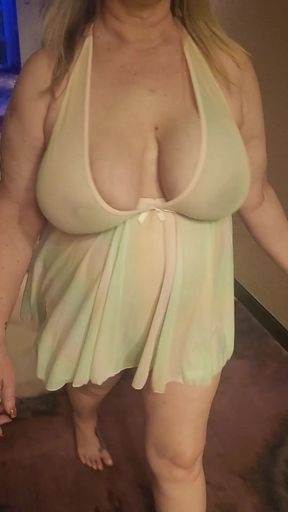 Blonde milf shows off her big tits and ass