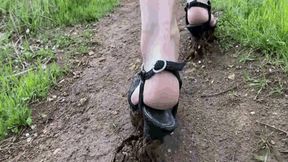 Jeannette walks in the mud in high heelsSD