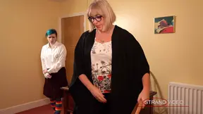 Older woman spanks young man against the wall