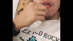 American Indian Boy fooling around while is jerking in living room