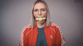 Emily E is ball gagged and extremly drooling with a tennisball gag and dances in Slo Motion