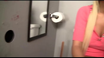Riley Surprised By Big Dick Poking Through The Bathroom Wall, And Sucks It
