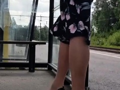 HannaTransa Chastity Crossdresser outdoors at train station.