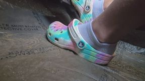 Chrissy socks and crocs in car