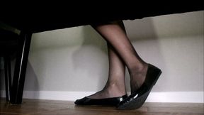 Shoeplay in black stocking with ballet flats