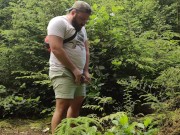Huzzbearz bear pissing in the woods
