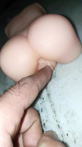 Boy play with sex doll pussy