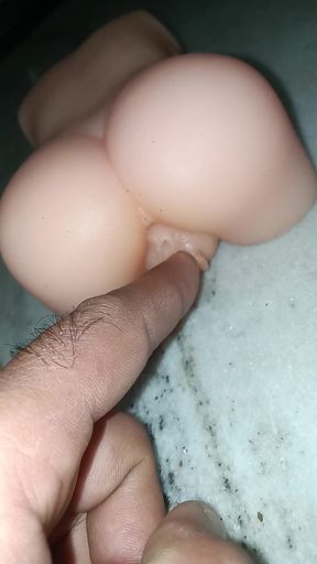 Boy play with sex doll pussy