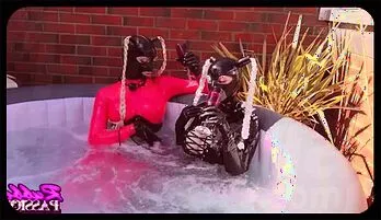 Sensual Latex Lesbians in Steamy Hot Tub Fun Fan favorite