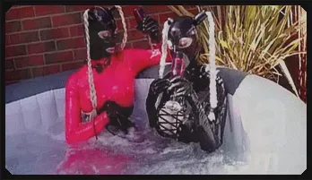 Sensual Latex Lesbians in Steamy Hot Tub Fun