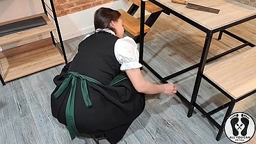 SENSUAL LATINA CARPENTER CUTTING WOOD IN A DIRNDL