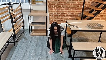 SENSUAL LATINA CARPENTER CUTTING WOOD IN A DIRNDL