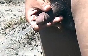 Lonely tranny jerks on a beach