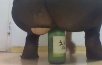 I am horny Korean whore and I love to stuff my pussy with a beer bottle