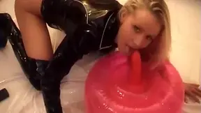 Latex-clad teen 18+ blonde and her dildo