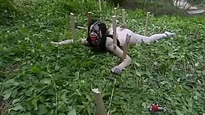 Raven Haired Beauty Gets Tied Up In The Garden