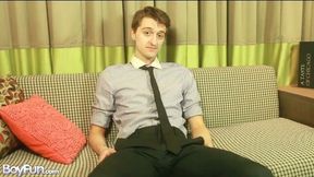 Suave business guy Scott Anders jerks off on a couch