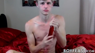 Young gay Cal Kennedy stuffing dildo and solo jerking off