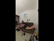 Stepsister masturbates him and performs blowjob while he watches the game.