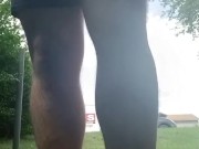 Sean pissing outdoors barefoot