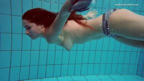 Big tits teenie Liza Bubarek swimming naked in the pool