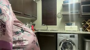 Ebony MILF Moaning and Stripteasing in Kitchen