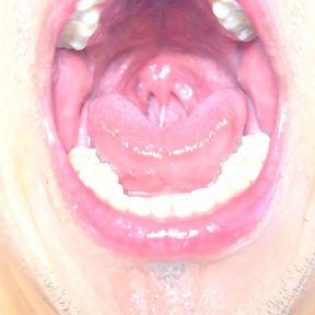 Delicious wide open mouth with lots of saliva