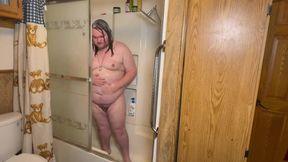 Bear squeezing out in steaming shower mess