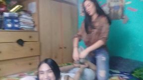 "THIANY TICKLES ZULA'S FEET"