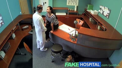 Blonde patient rides her doctor in a fake hospital office during a private session