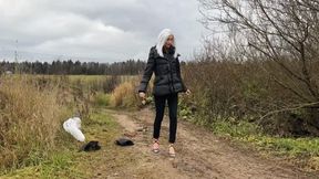 A girl in high-heeled shoes with an open heel walks through the mud and slides (short version)