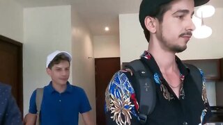 Muscular Latino and a pale lad having raw sex on the sofa