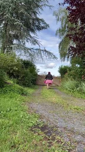 Dressed in a little pink pleated skirt for an evening out