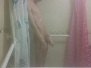 Hot very skinny guy with flat butt strokes his wet cock and pisses