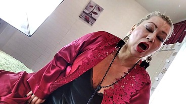 Mature Slut Wife in a red satin negligee, with a ponytail on her head and a dick in her mouth ...))