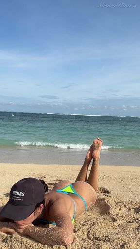 Teasing on the Beach in Micro Bikini on the Sand