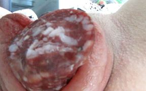 Maid Fucks Her Cunt with Salami