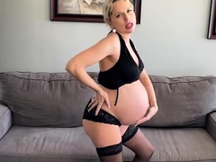 Pregnant blonde housewife showing off her sexy curves