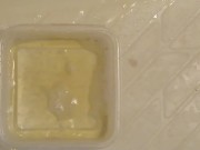 Pissing into the plastic case.