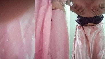 Indian Gay Crossdresser Gaurisissy Pressing and Playing with Her Big Boobs Looking in Pink Saree Looking Like a Housewife