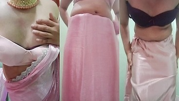Indian Gay Crossdresser Gaurisissy Pressing and Playing with Her Big Boobs Looking in Pink Saree Looking Like a Housewife