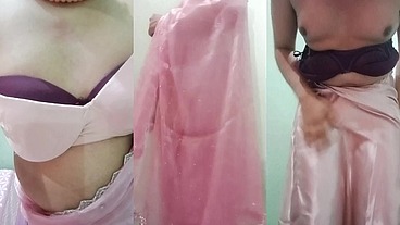 Indian Gay Crossdresser Gaurisissy Pressing and Playing with Her Big Boobs Looking in Pink Saree Looking Like a Housewife