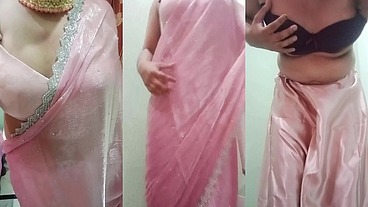 Indian Gay Crossdresser Gaurisissy Pressing and Playing with Her Big Boobs Looking in Pink Saree Looking Like a Housewife