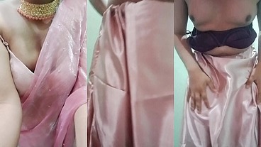 Indian Gay Crossdresser Gaurisissy Pressing and Playing with Her Big Boobs Looking in Pink Saree Looking Like a Housewife