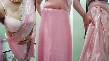 Indian Gay Crossdresser Gaurisissy Pressing and Playing with Her Big Boobs Looking in Pink Saree Looking Like a Housewife