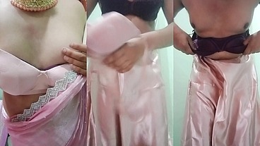 Indian Gay Crossdresser Gaurisissy Pressing and Playing with Her Big Boobs Looking in Pink Saree Looking Like a Housewife