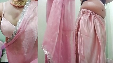 Indian Gay Crossdresser Gaurisissy Pressing and Playing with Her Big Boobs Looking in Pink Saree Looking Like a Housewife