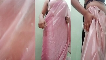 Indian Gay Crossdresser Gaurisissy Pressing and Playing with Her Big Boobs Looking in Pink Saree Looking Like a Housewife